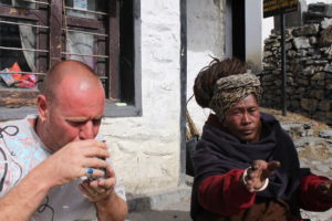 Two people drinking tea in Nepal