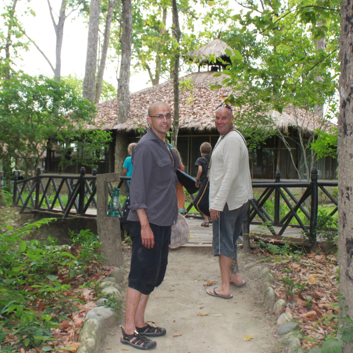 Two men looking at camera waiting